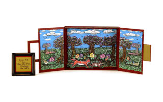 A box opens up into a trifold with a fox chasing a rabbit through a forest.
