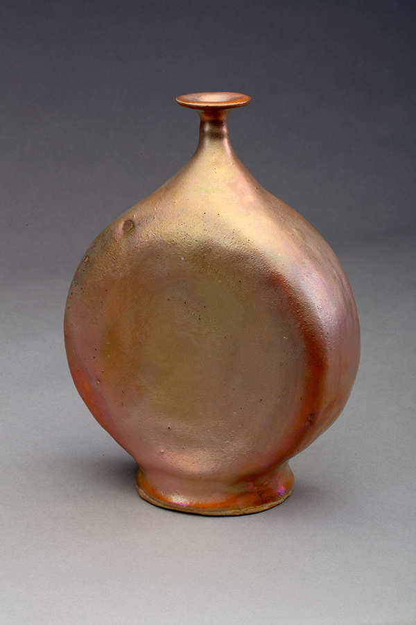Shiny, rotund bottle with a thin neck and wide base