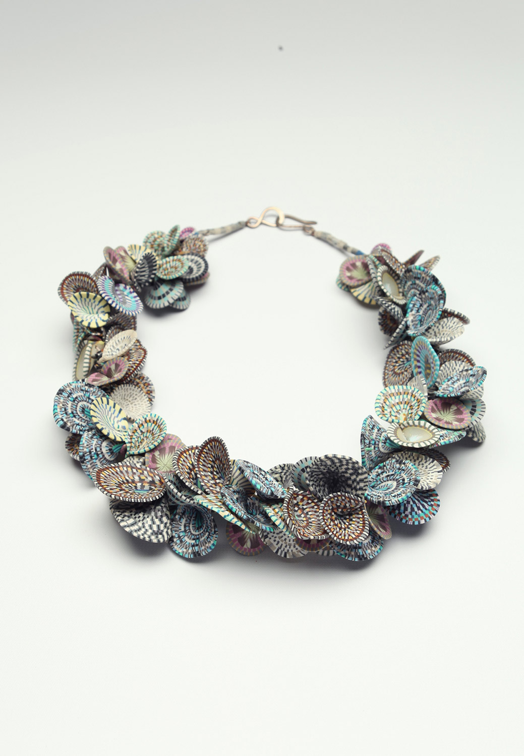 Necklace with multicolored overlapping polymer shells