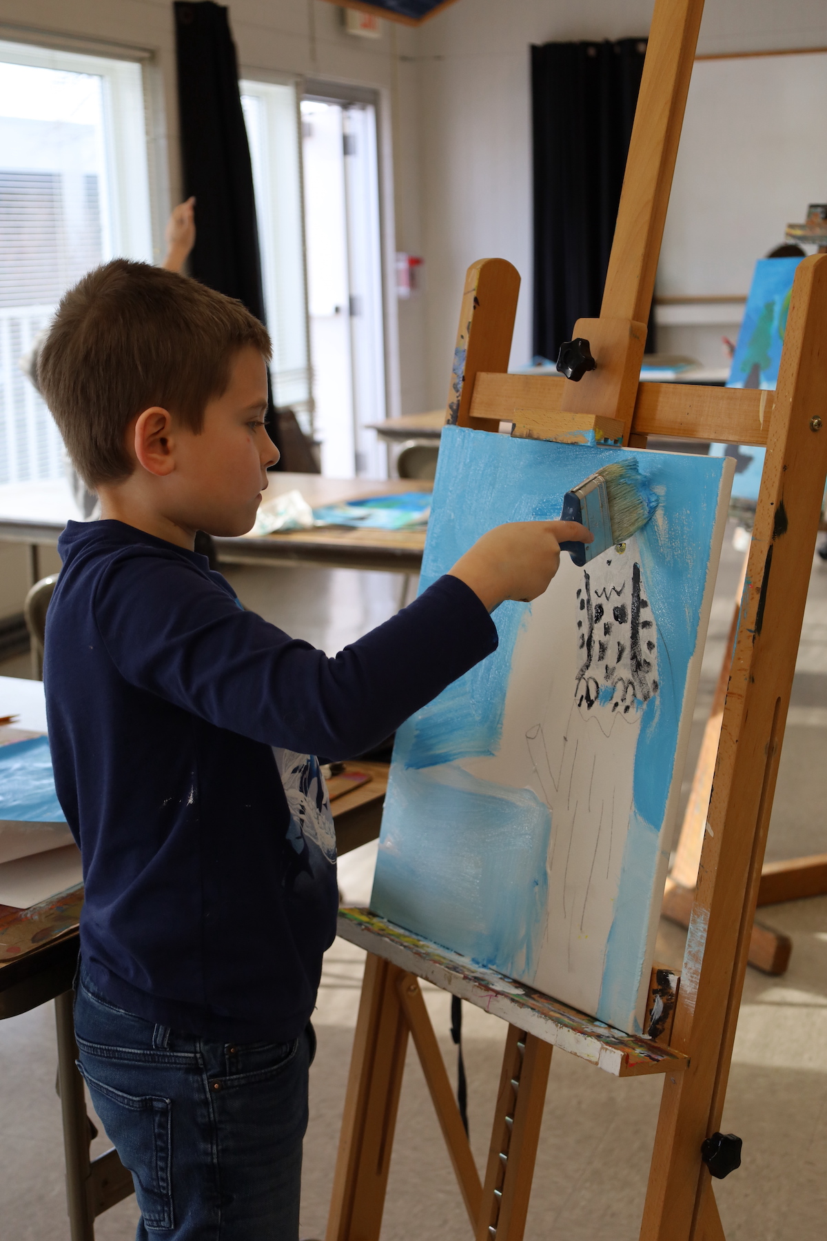 Boy Painting Woodland Animals