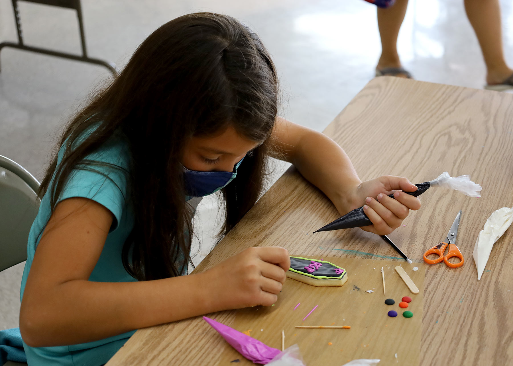 Girl Decorating Cookie Fall 2021