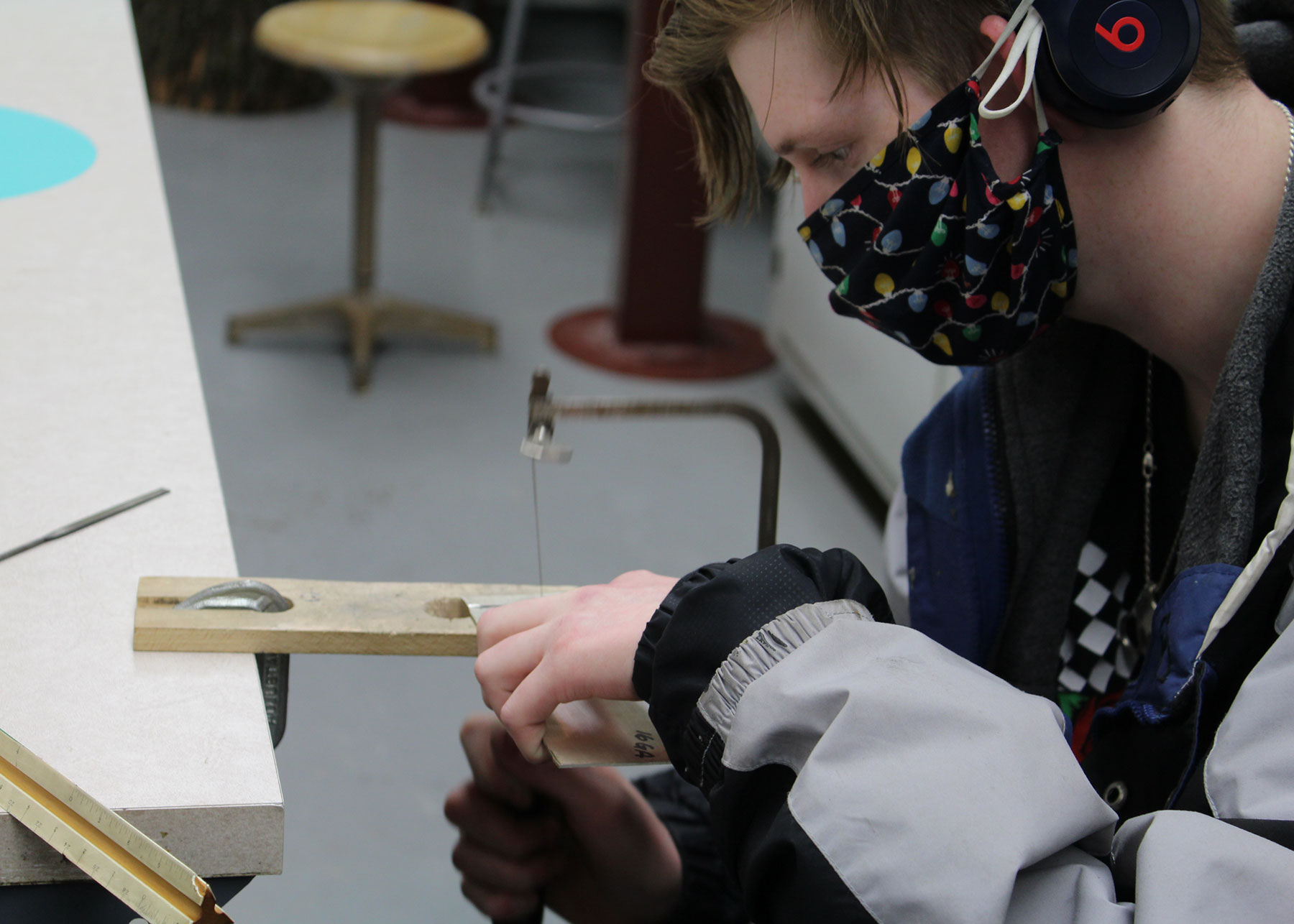 Man Cutting Sheet Metal