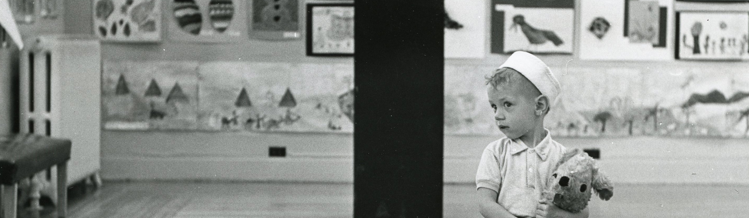 Historic Wustum child with stuffed animal (crop)