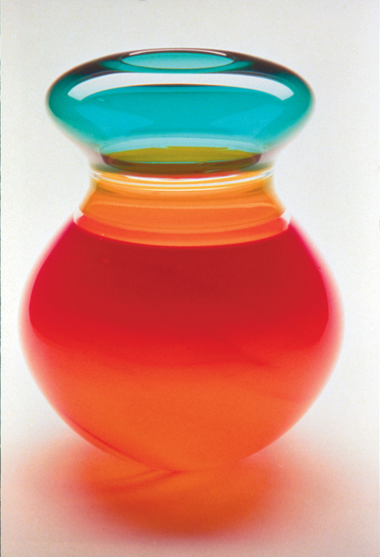 https://www.ramart.org/wp-content/uploads/permanent-collection/glass/Blomdahl-1993.24-Red-Yellow-Green-Vessel-1.jpg